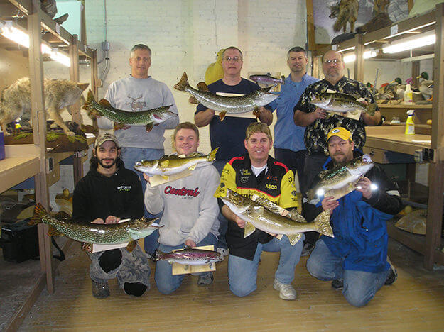Image of group with taxidermized fish